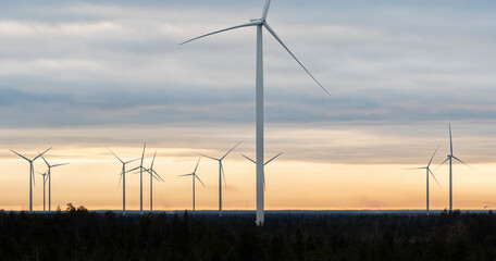 Windmills on a cold winter morning with moody sky in the background