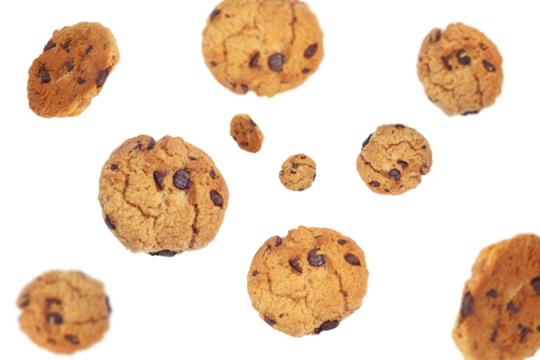 Delicious chocolate chip cookies falling on transparent background png