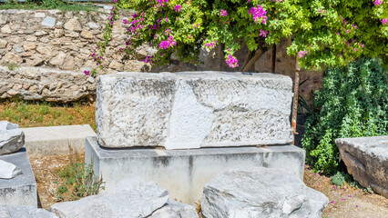 Ancient building blocks in site of ruins in Greece.