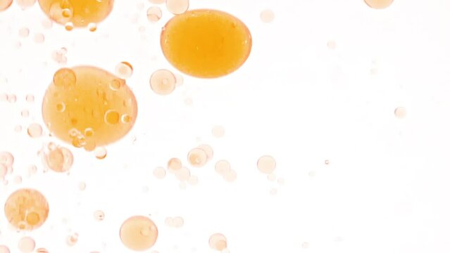 Macro Shot of Various Air Bubbles in Water Rising up on Light White Background. Liquid Cream Gel Transparent Cosmetic Sample Texture With Bubbles. Concept of Clean and Purity. High quality FullHD