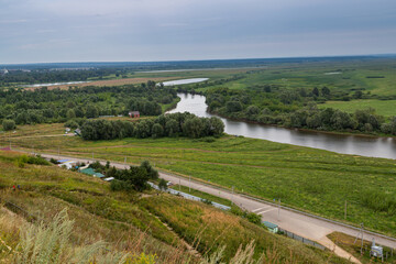 Fototapeta na wymiar View of Kama River. Mouth of Toima River. Toyma flows into Kama near town Yelabuga, Russia. Summer natural landscape