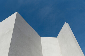 white concrete architecture with blue sky