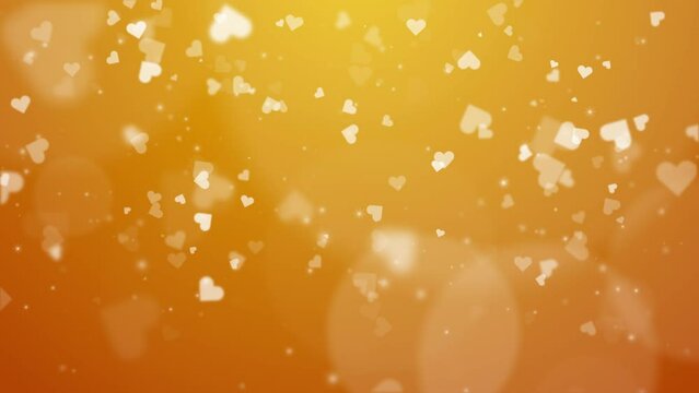 Falling hearts on yellow animated love background with bright glow and bokeh. Copy space. Anniversary, Valentine's Day. Looped motion graphics.