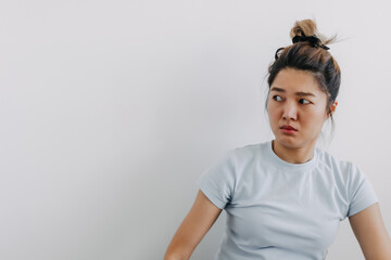 Funny face of asian Thai woman looking something at empty space with doubt and curious isolated...