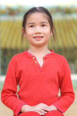 Asian girl in red dress