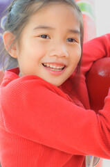 Asian girl in red dress