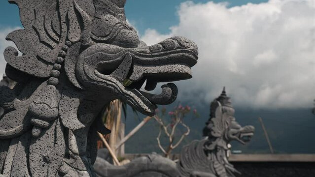 Statues of gods at the entrance to a Balinese temple