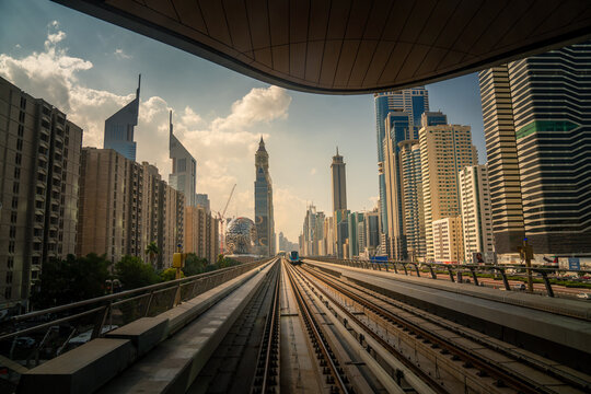 Dubai's Urban Journey: Railway Perspective with Majestic City Skyline