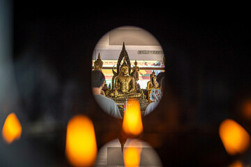 The Lamp for add oil pay Candles to pay homage to Buddha for worship with faith to Buddha statue in...