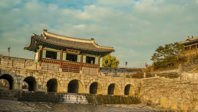 Time lapse, Suwon Hwaseong Fortress, Hwahongmun Gate with clouds flowing beautifully, Zoom in