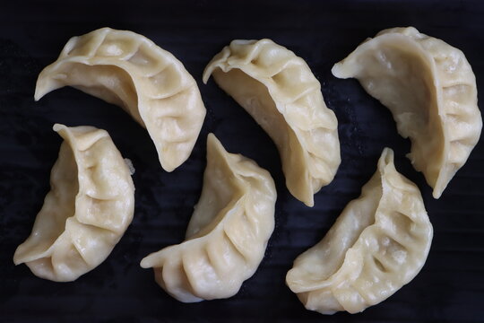 Veg steam momo, Nepalese Traditional dish Momo stuffed with vegetables and then cooked and served with sesame sauce