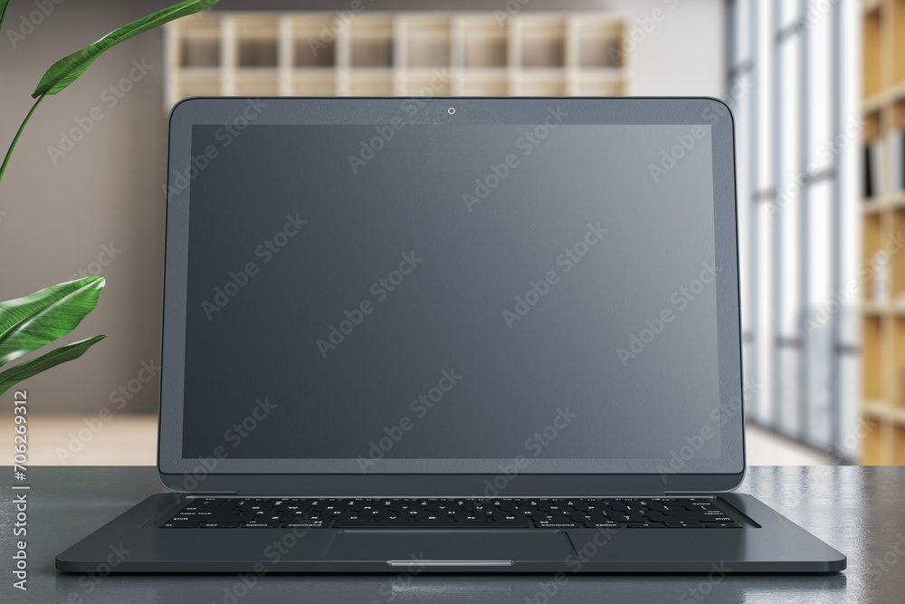 Leinwandbilder modern designer office desk with empty mock up laptop screen and other items on blurry office backgr