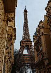 Beautiful view of Eiffel Tower. Concept moody photo with the landmark building of Paris. Paris architecture and Eiffel Tower.