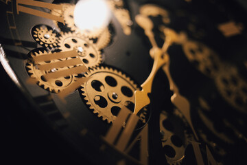 Clock wheels mechanism. Concept photo for time passing. Clock details and how it work.