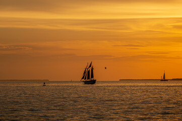 Spectacular Key West sunset, Gulf of Mexico with yachts and boats on the background