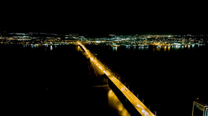 Astrakhan, Russia. New bridge across the Volga river. Night view of the city, Aerial View