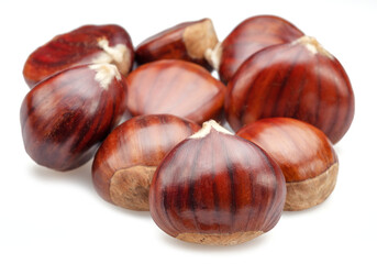 Edible sweet chestnuts isolated on white background.