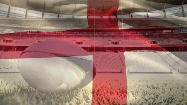 Animation of waving flag of england over stadium with rugby ball