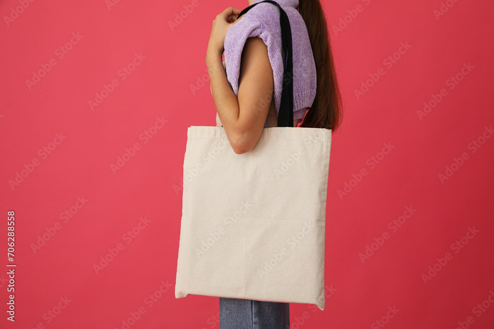 Sticker White bag in hands on a red background