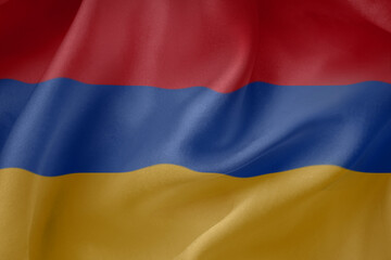Armenia  waving flag close up fabric texture background