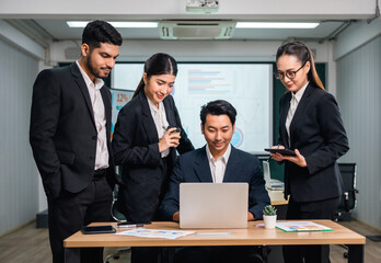 Asian business people team analyzing statistics financial. Team of businesspeople Meeting Conference Discussion Corporate Concept in office.