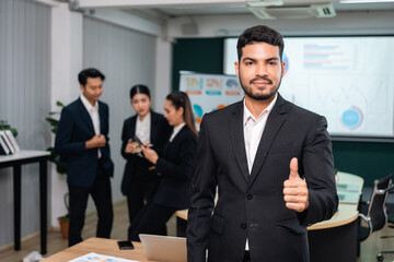 Asian business people team analyzing statistics financial. Team of businesspeople Meeting Conference Discussion Corporate Concept in office.