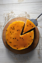 Passion fruit cheesecake.Top view.Vertical format