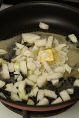 Finely chopped onions are fried in butter