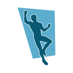 Silhouette of a man in oriental martial art pose. Silhouette of a male in martial art move.