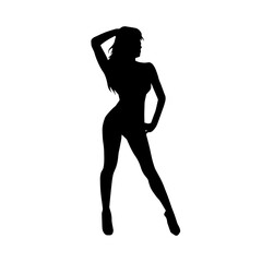 Silhouette of a young slim female model in tight outfit. Silhouette of a slim woman in feminine pose.