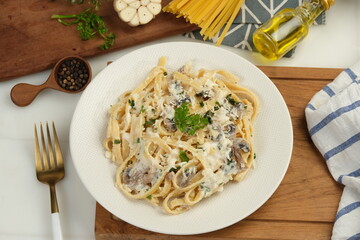 homemade fettuccine pasta with creamy mushroom sauce,.Italian food style.