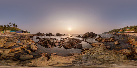 Fototapeta na wymiar full hdri 360 panorama view on ocean on shore with rocks at sunset in equirectangular projection with zenith and nadir. VR AR content