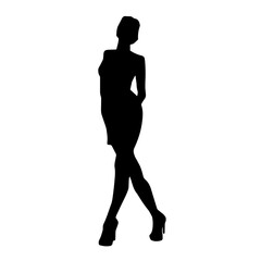 Silhouette of a young slim female model in tight outfit. Silhouette of a slim woman in feminine pose.