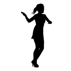 Silhouette of a slim female in dance pose. Silhouette of a woman dancing.