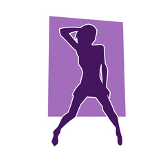 Silhouette of a slim female in dance pose. Silhouette of a woman dancing.