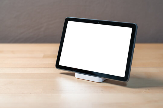tablet pc background at a wooden table