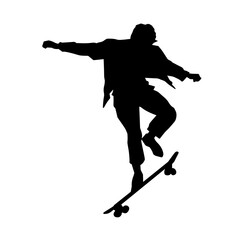 Silhouette of a male in action pose on skateboard. Silhouette of an urban boy on skateboard.
