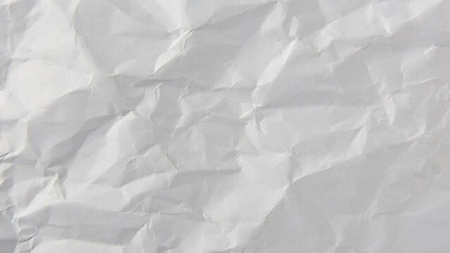 Stop motion animated crumpled white paper texture  background.
