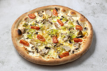 Delicious pizza isolated.Pizza with cherry tomatoes,mashrooms,sousage.