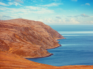 Obraz premium Rocky Barents Sea coast. Beautiful landscape, wilderness. North Cape. Nordkapp, Norway