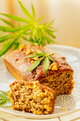 Freshly tasty baked bread with the addition of cannabis, decorated with hemp leaves