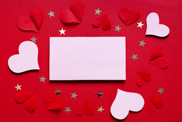 Happy Valentines day empty paper mockup card with paper hearts and confetti stars for invitation, posters, banners. Celebrate women's day achievement.