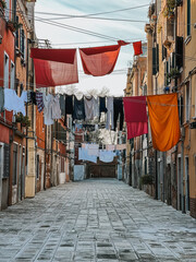 Colorful residential area with clothesline between houses in Venice 