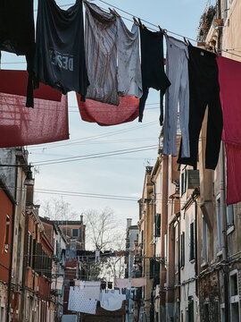 Italian residential area with clothesline between houses