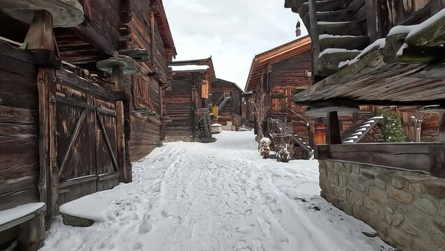 Bellwald, an old Swiss village in winter with snow. Old huts and cottages in Switzerland