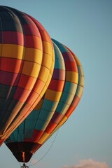 Colorful hot air balloons flying in the sky. Perfect for travel and adventure concepts