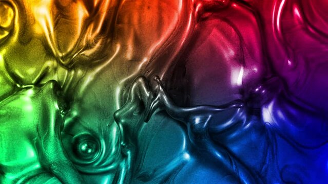 Super Slow Motion Shot of Waving Colorful Metallic Background at 1000fps.