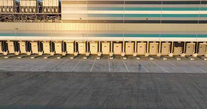 Loading dock at distribution center. Logistics and loading of trucks. Warehouse distribution.