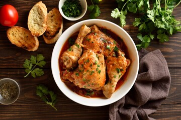 Georgian chicken stew with tomatoes and herbs