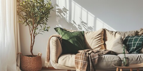 A cozy living room with a comfortable couch and a vibrant plant. Perfect for home decor or interior design inspiration